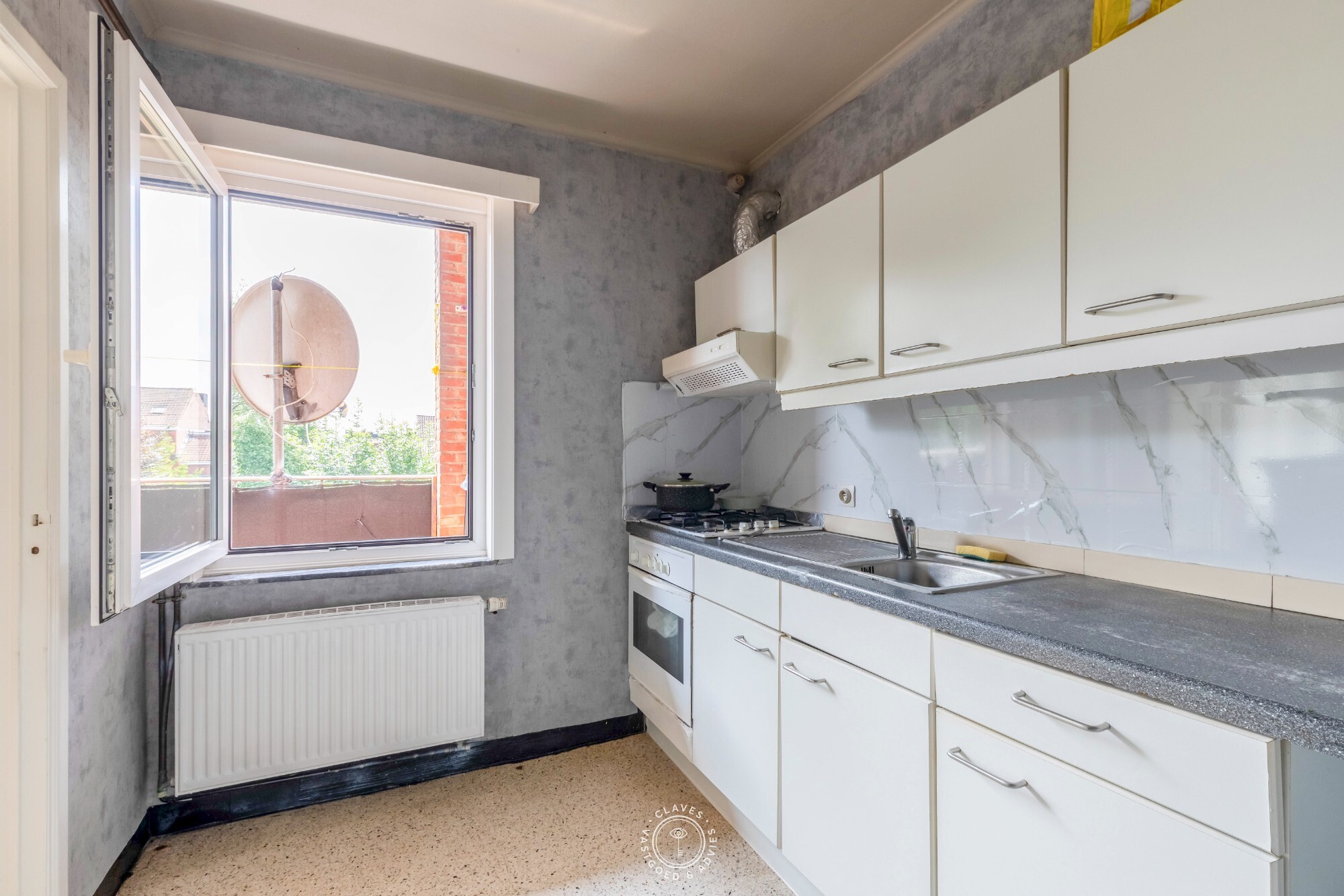 Opbrengsteigendom met drie appartementen op gunstige locatie in centrum Sint-Niklaas