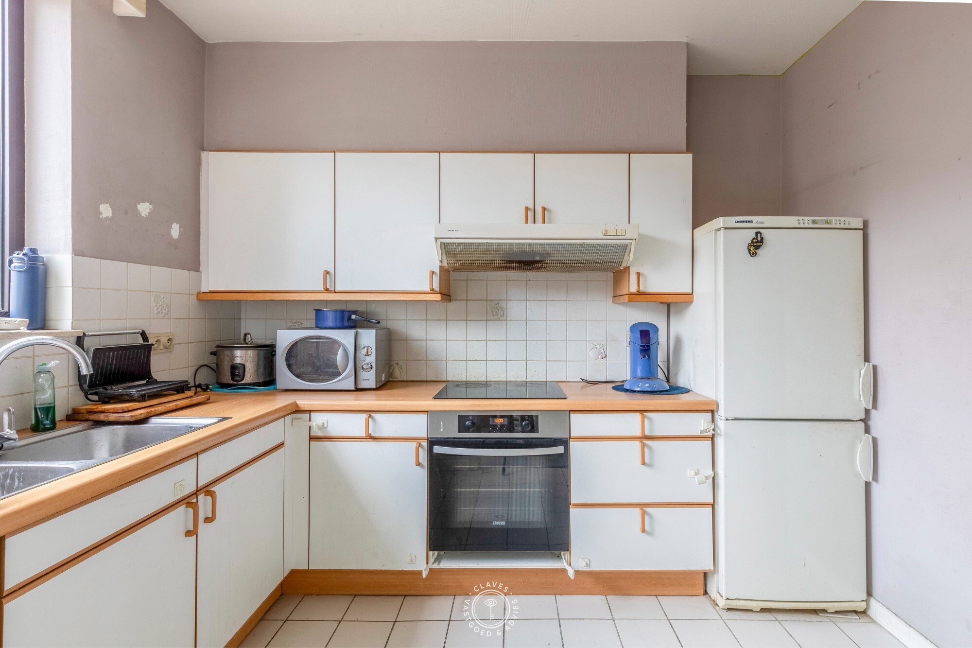 Lichtrijk tweeslaapkamerappartement met autostaanplaats op toplocatie