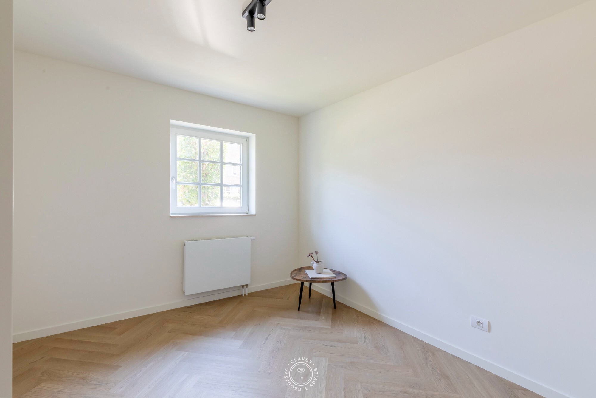 High-end vernieuwbouwappartement met privatieve tuin