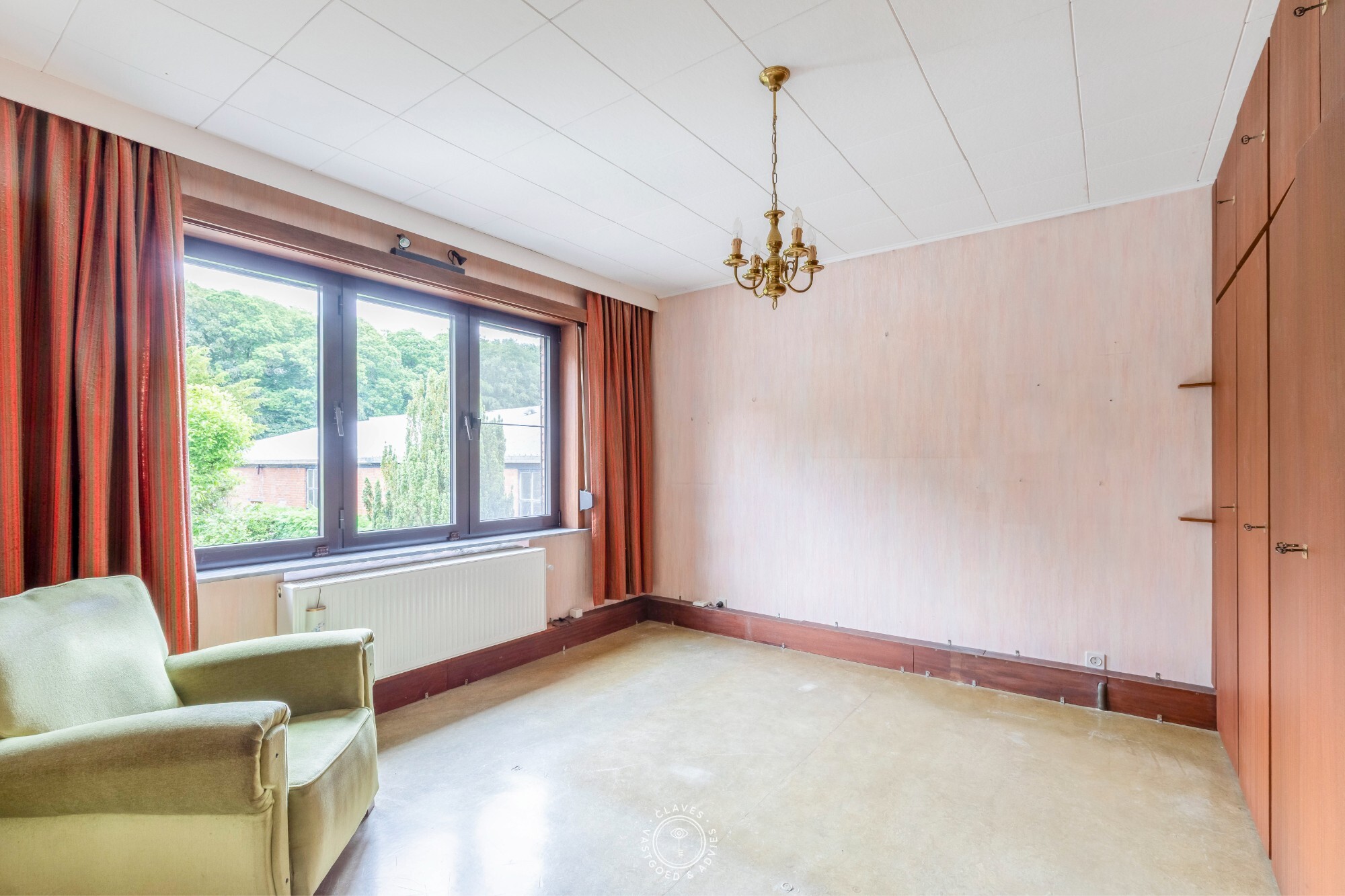 Open bebouwing met magazijn op een perceel van ca. 1.673 m²  in het centrum van Belsele