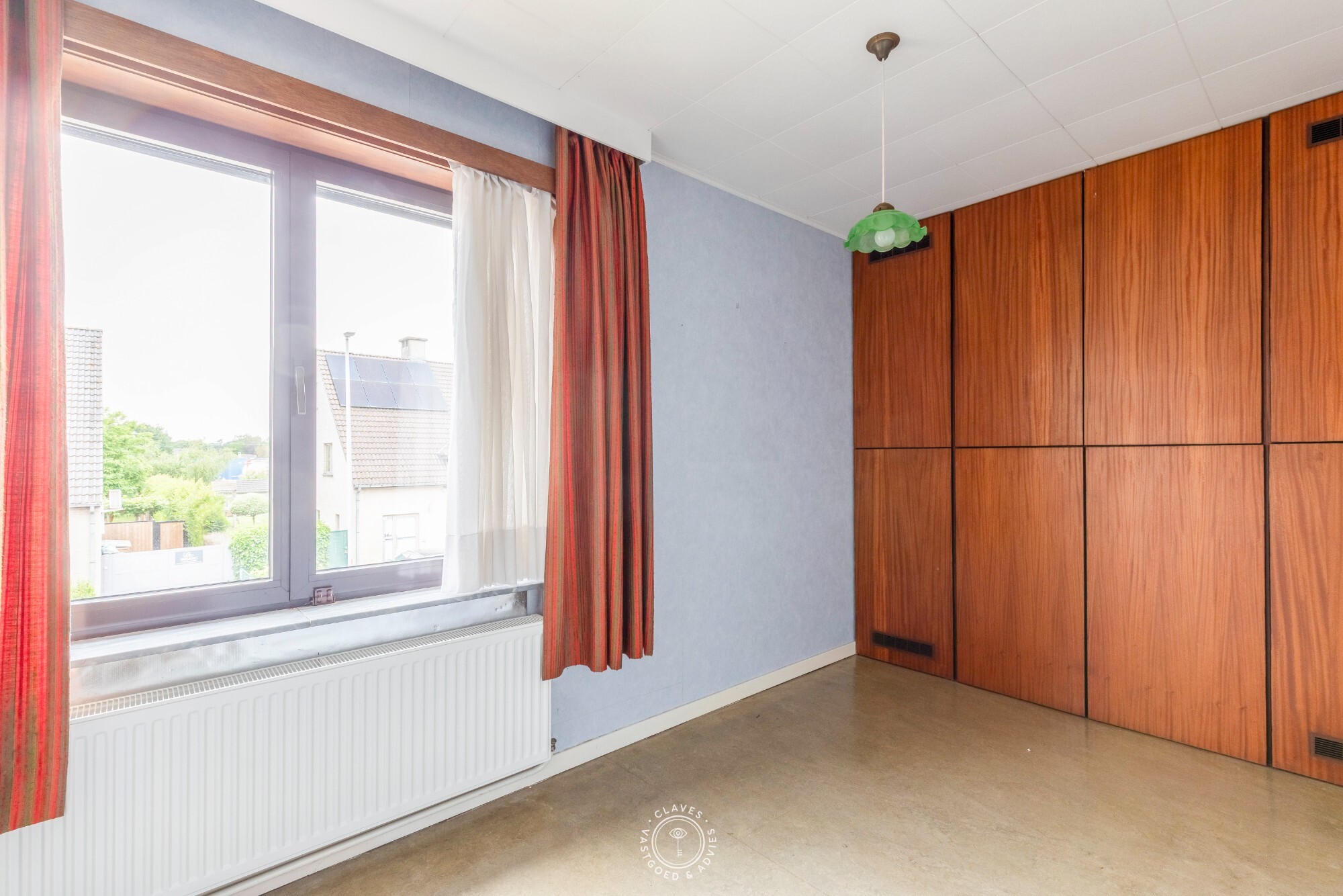Open bebouwing met magazijn op een perceel van ca. 1.673 m²  in het centrum van Belsele