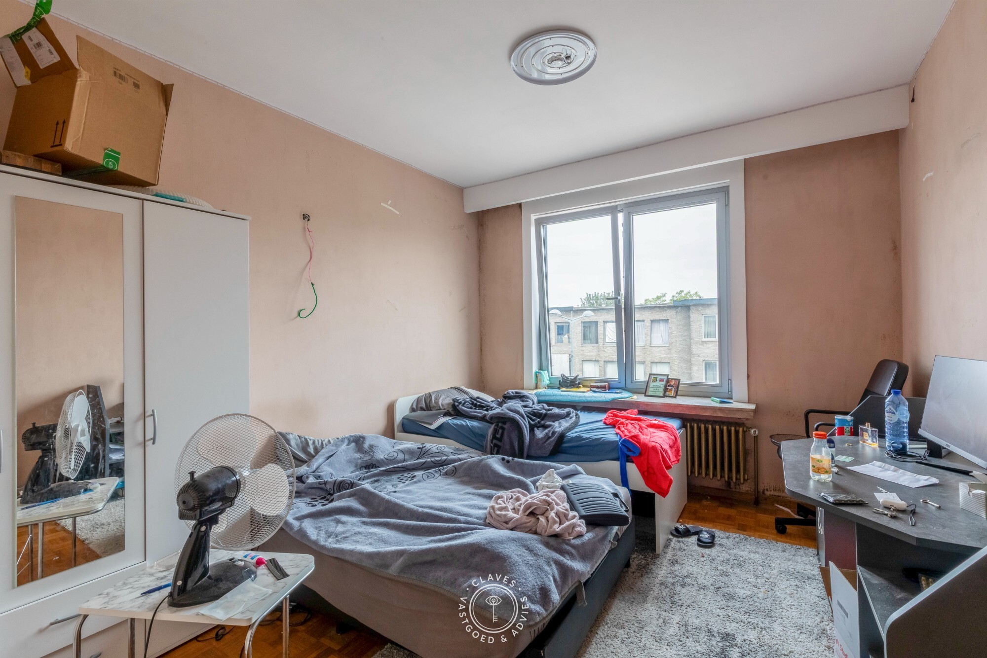 Interessante investeringseigendom in centrum Beveren met handelspand en 3 appartementen