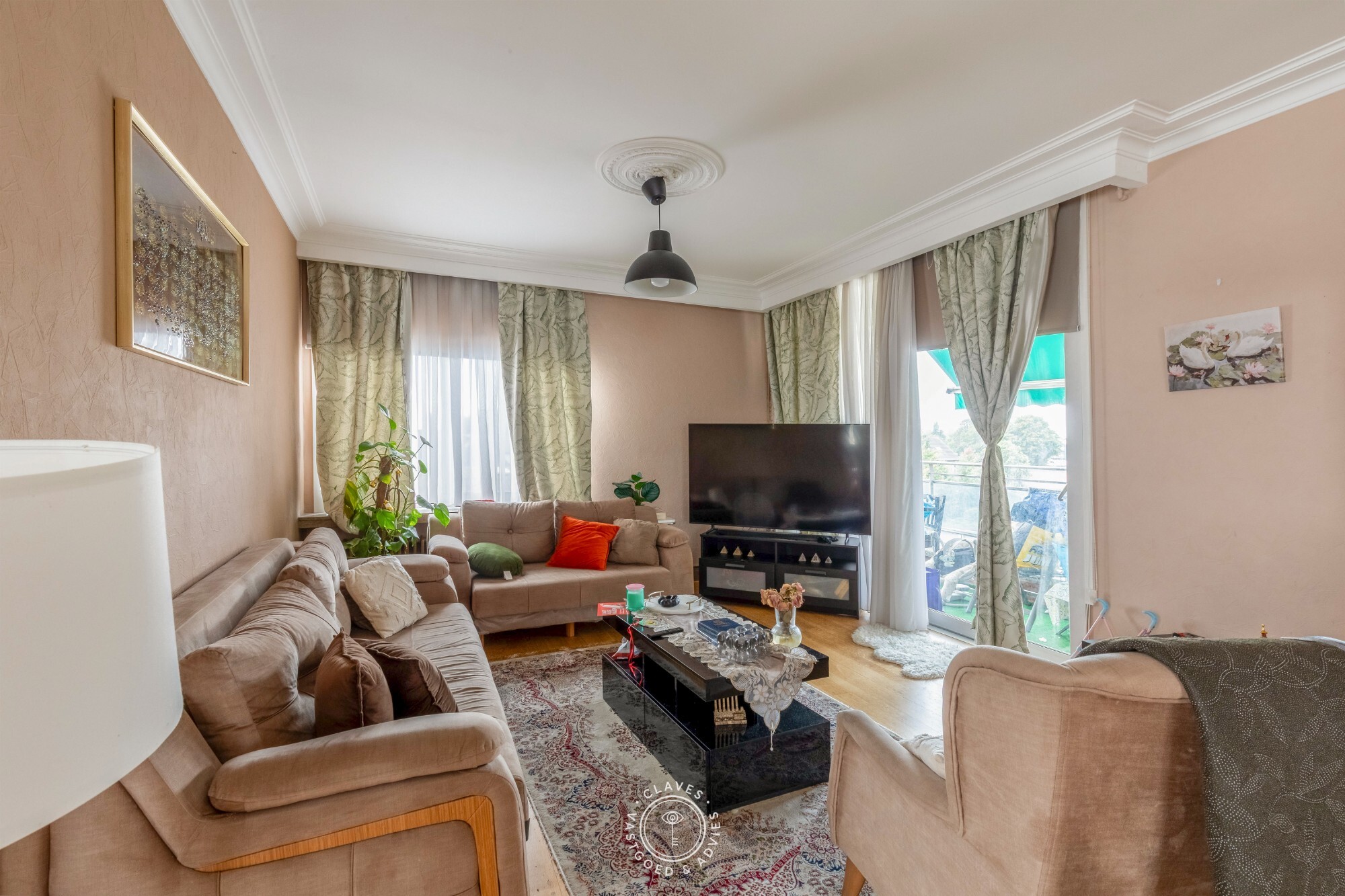 Interessante investeringseigendom in centrum Beveren met handelspand en 3 appartementen