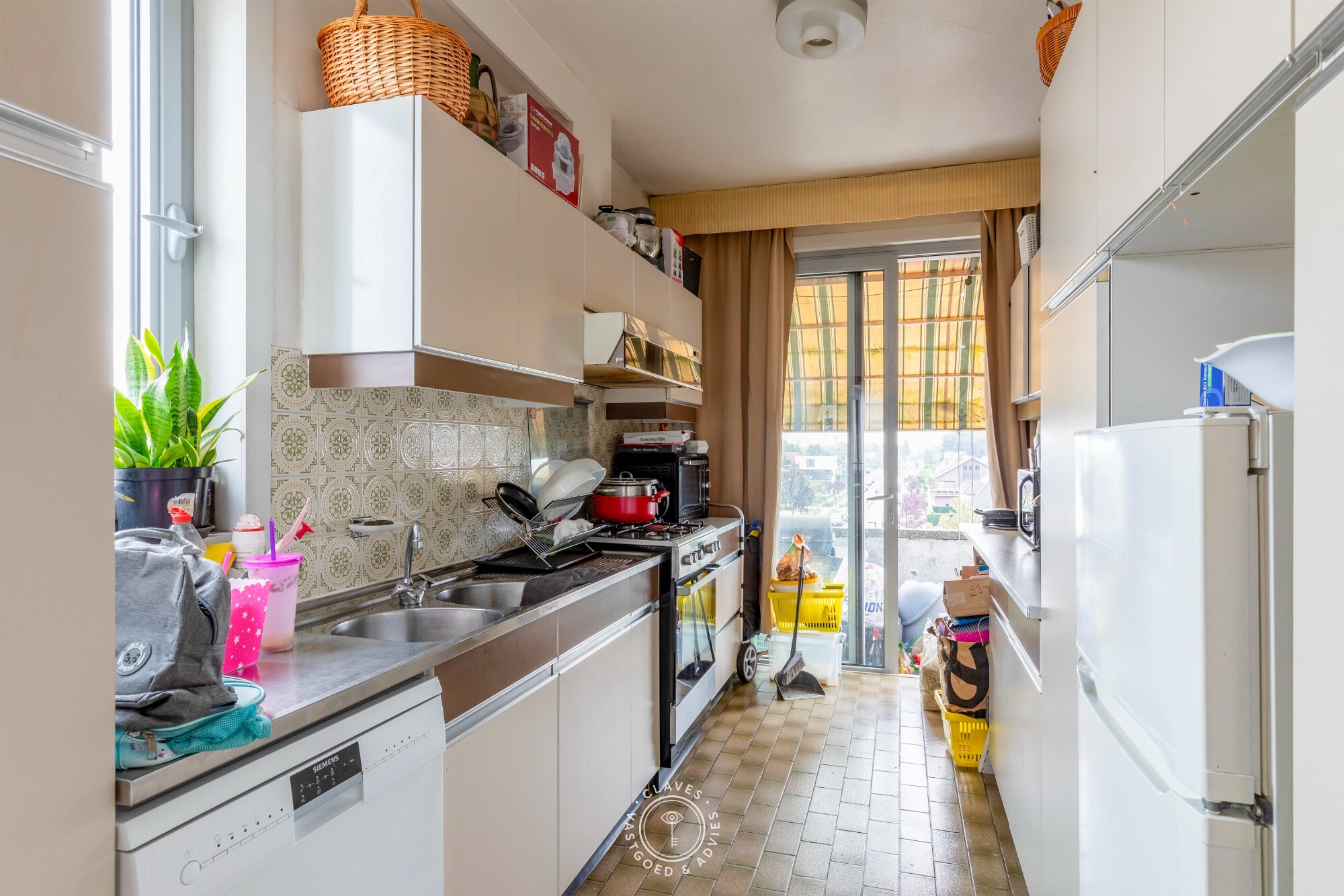 Interessante investeringseigendom in centrum Beveren met handelspand en 3 appartementen