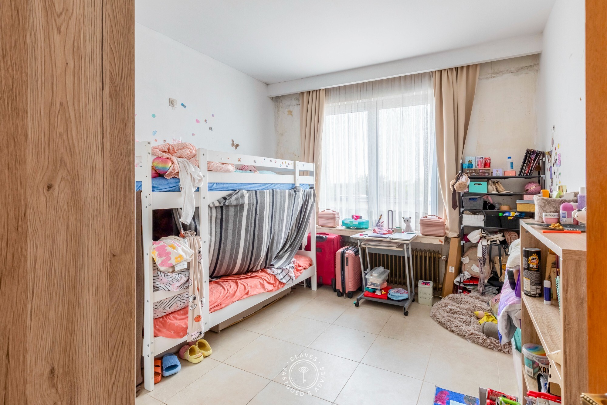 Interessante investeringseigendom in centrum Beveren met handelspand en 3 appartementen