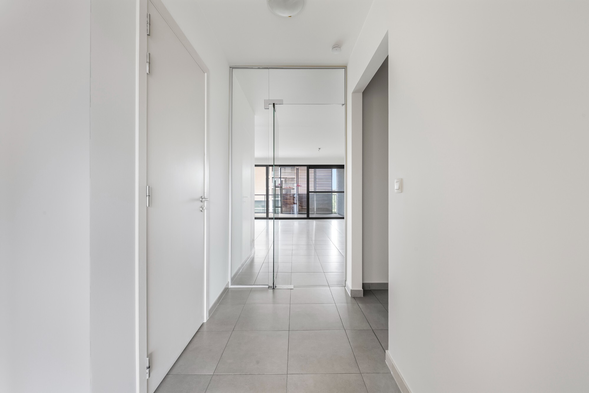 Lichtrijk appartement met Schelde-zicht, 2 slaapkamers en 2 parkeerplaatsen aan het Georges Van Dammeplein in Temse