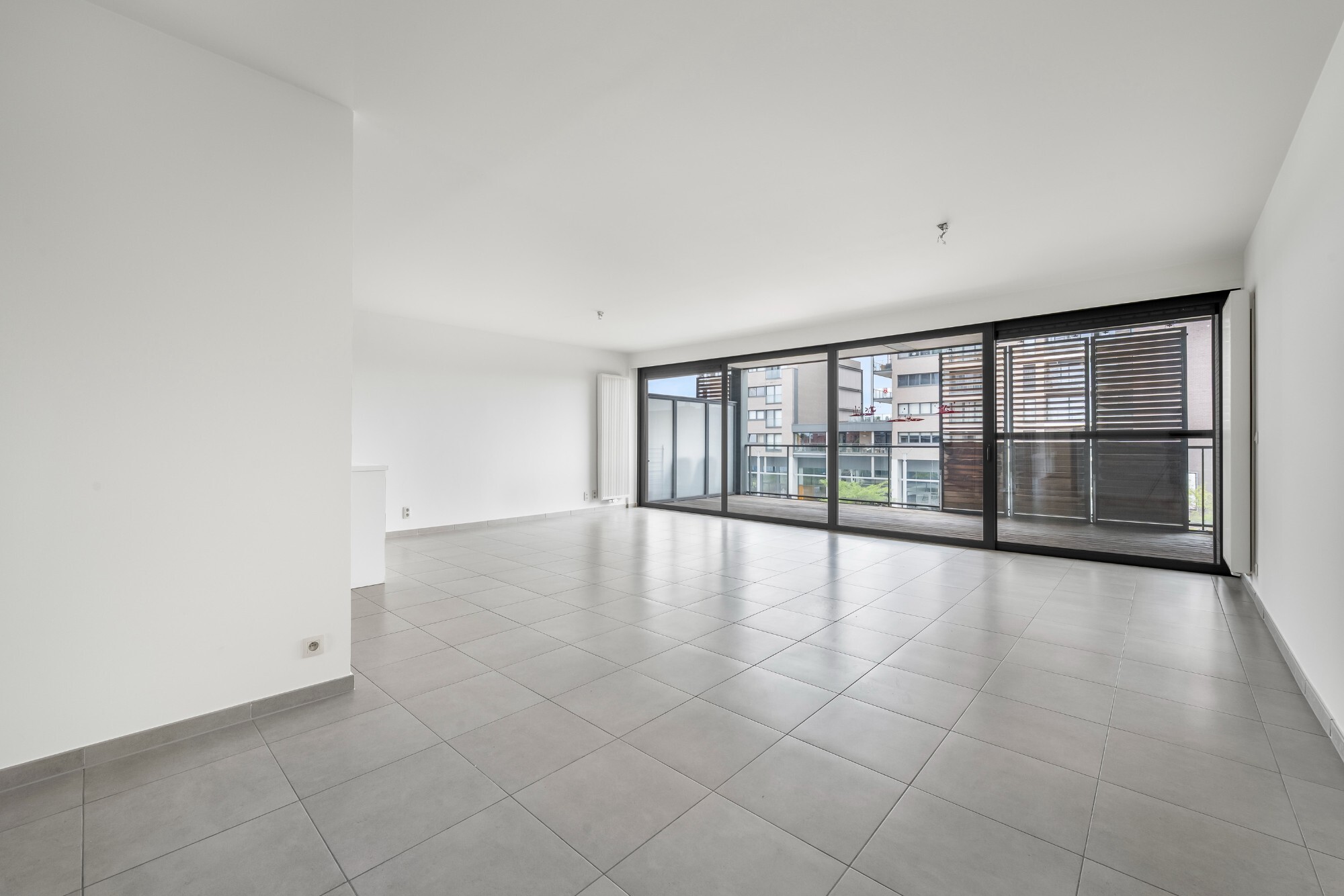 Lichtrijk appartement met Schelde-zicht, 2 slaapkamers en 2 parkeerplaatsen aan het Georges Van Dammeplein in Temse