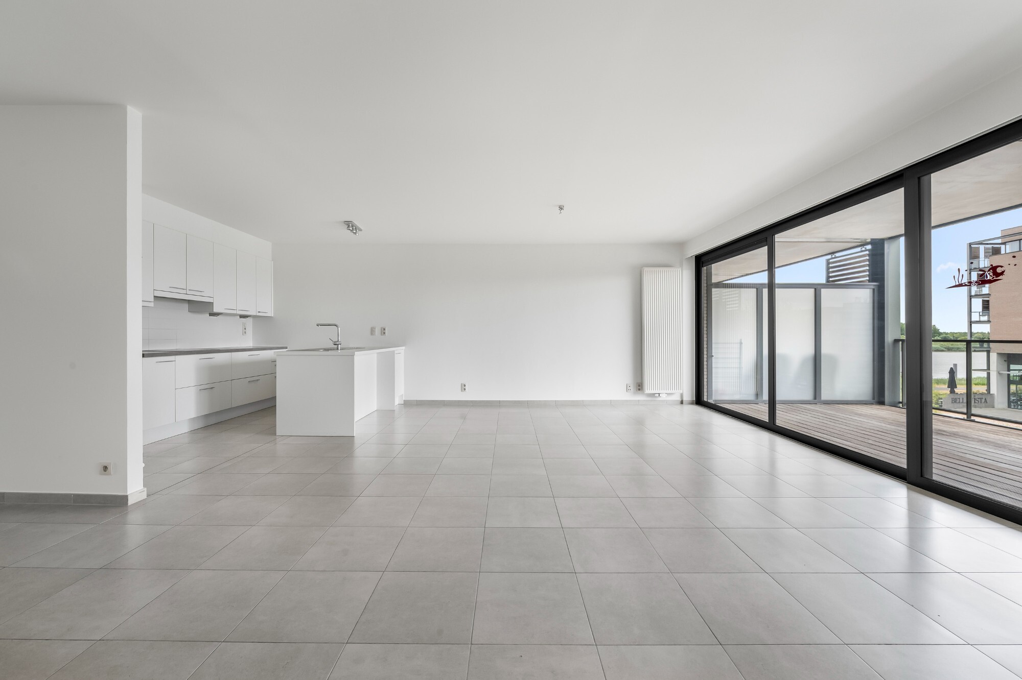 Lichtrijk appartement met Schelde-zicht, 2 slaapkamers en 2 parkeerplaatsen aan het Georges Van Dammeplein in Temse