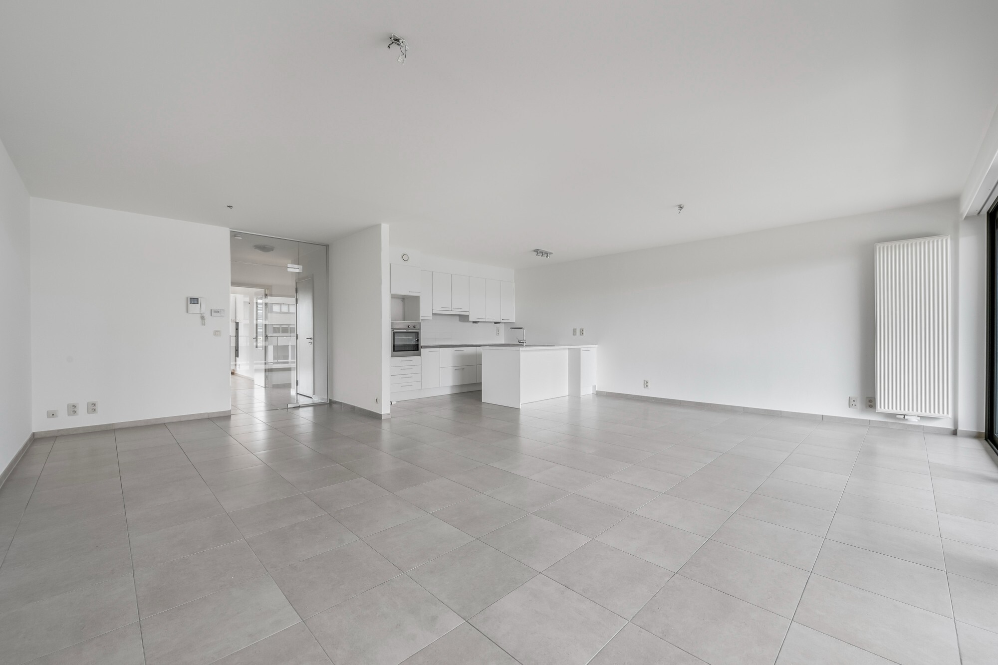 Lichtrijk appartement met Schelde-zicht, 2 slaapkamers en 2 parkeerplaatsen aan het Georges Van Dammeplein in Temse