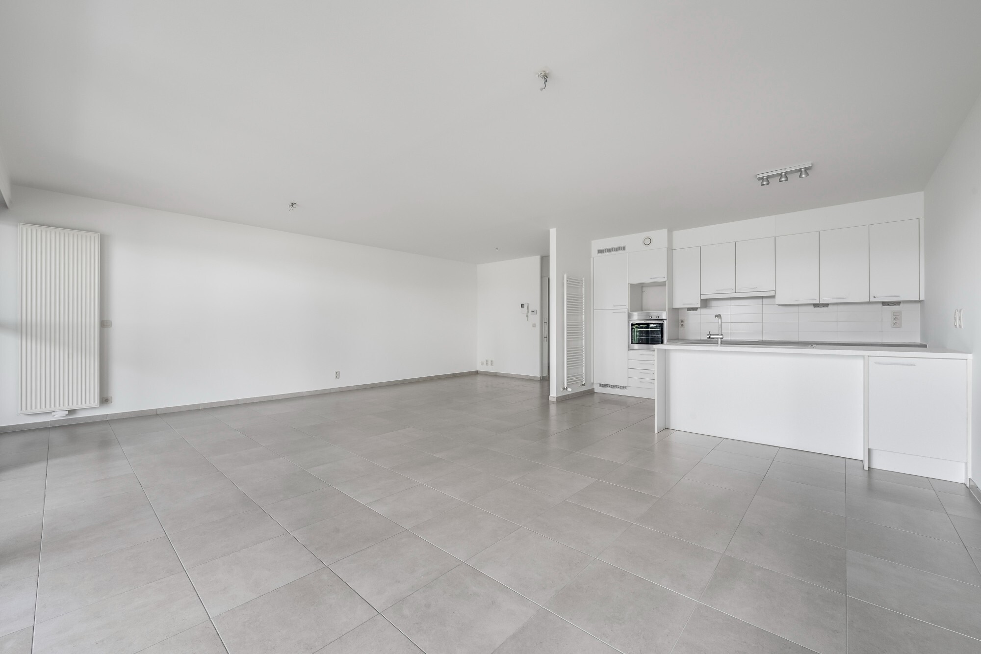 Lichtrijk appartement met Schelde-zicht, 2 slaapkamers en 2 parkeerplaatsen aan het Georges Van Dammeplein in Temse