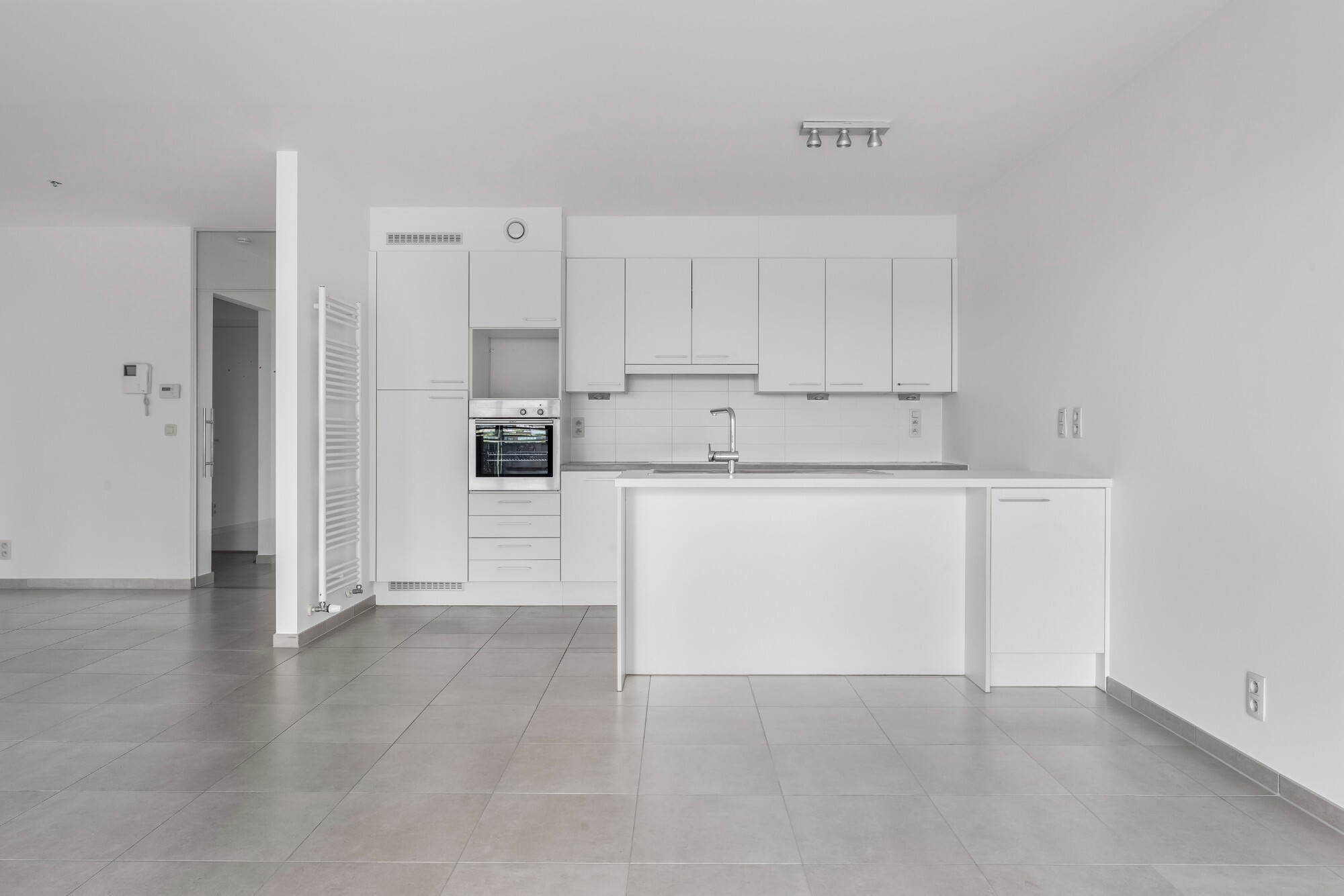 Lichtrijk appartement met Schelde-zicht, 2 slaapkamers en 2 parkeerplaatsen aan het Georges Van Dammeplein in Temse