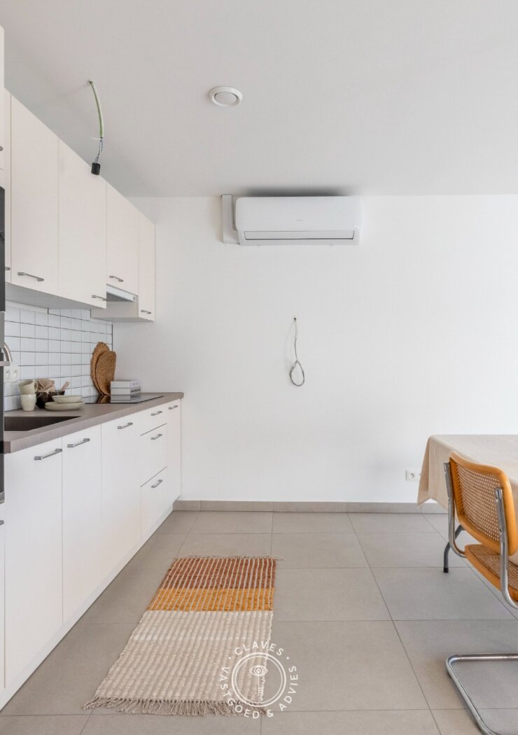 Ingrijpende energetische renovatie: gelijkvloers appartement met een zonnig terras aan 2%