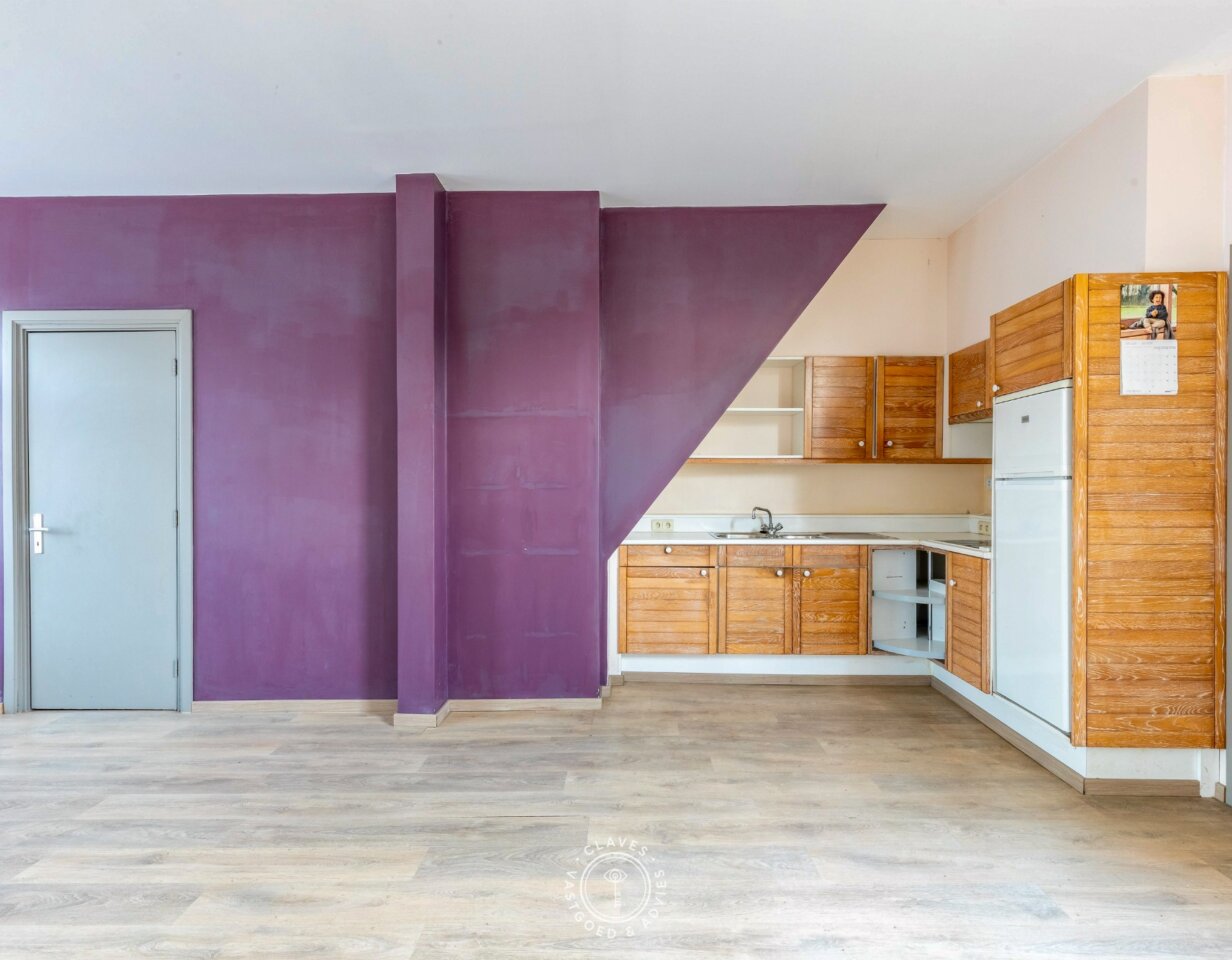 Te renoveren rijwoning met mogelijkheden in het hart van Nieuwkerken-Waas