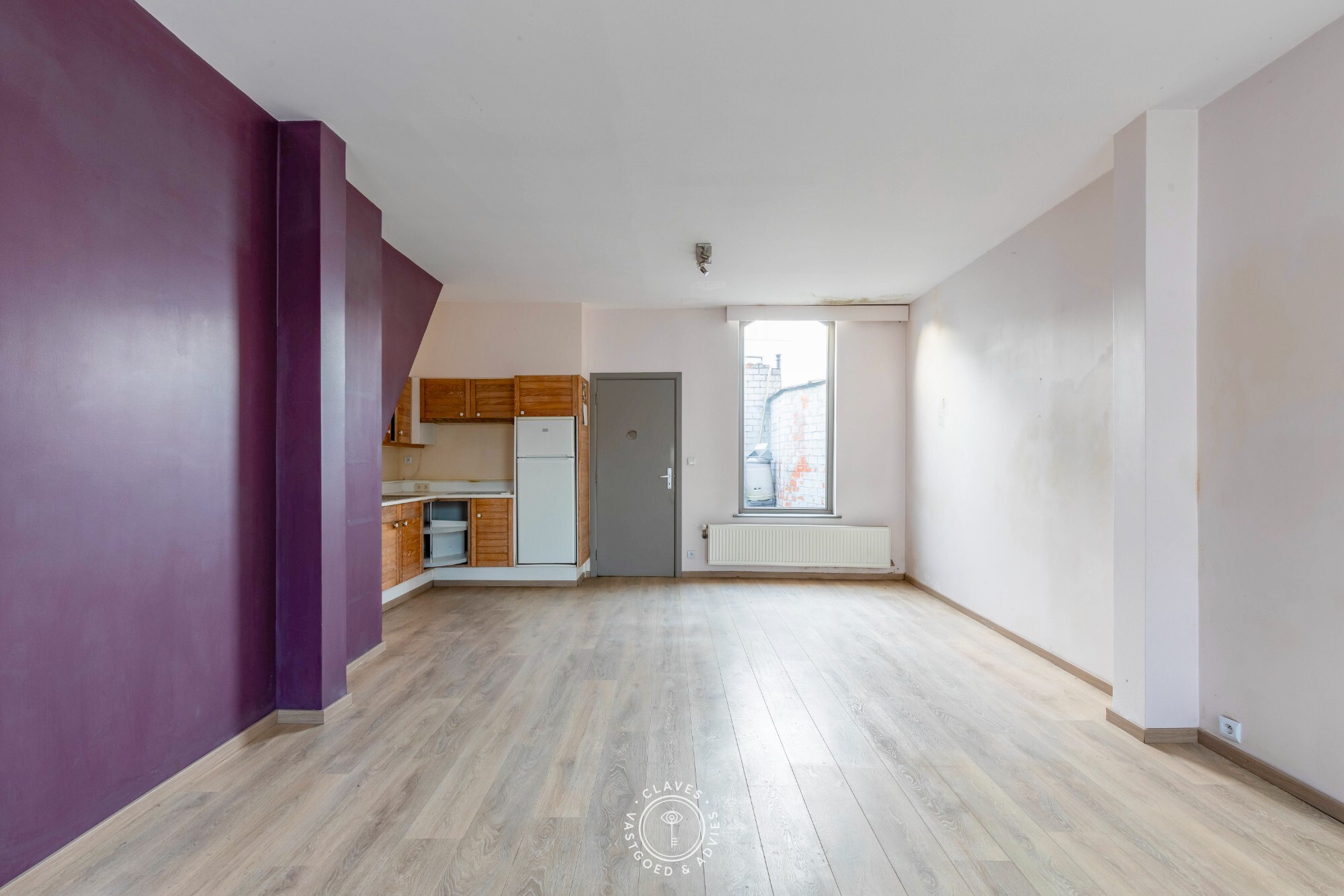 Te renoveren rijwoning met mogelijkheden in het hart van Nieuwkerken-Waas