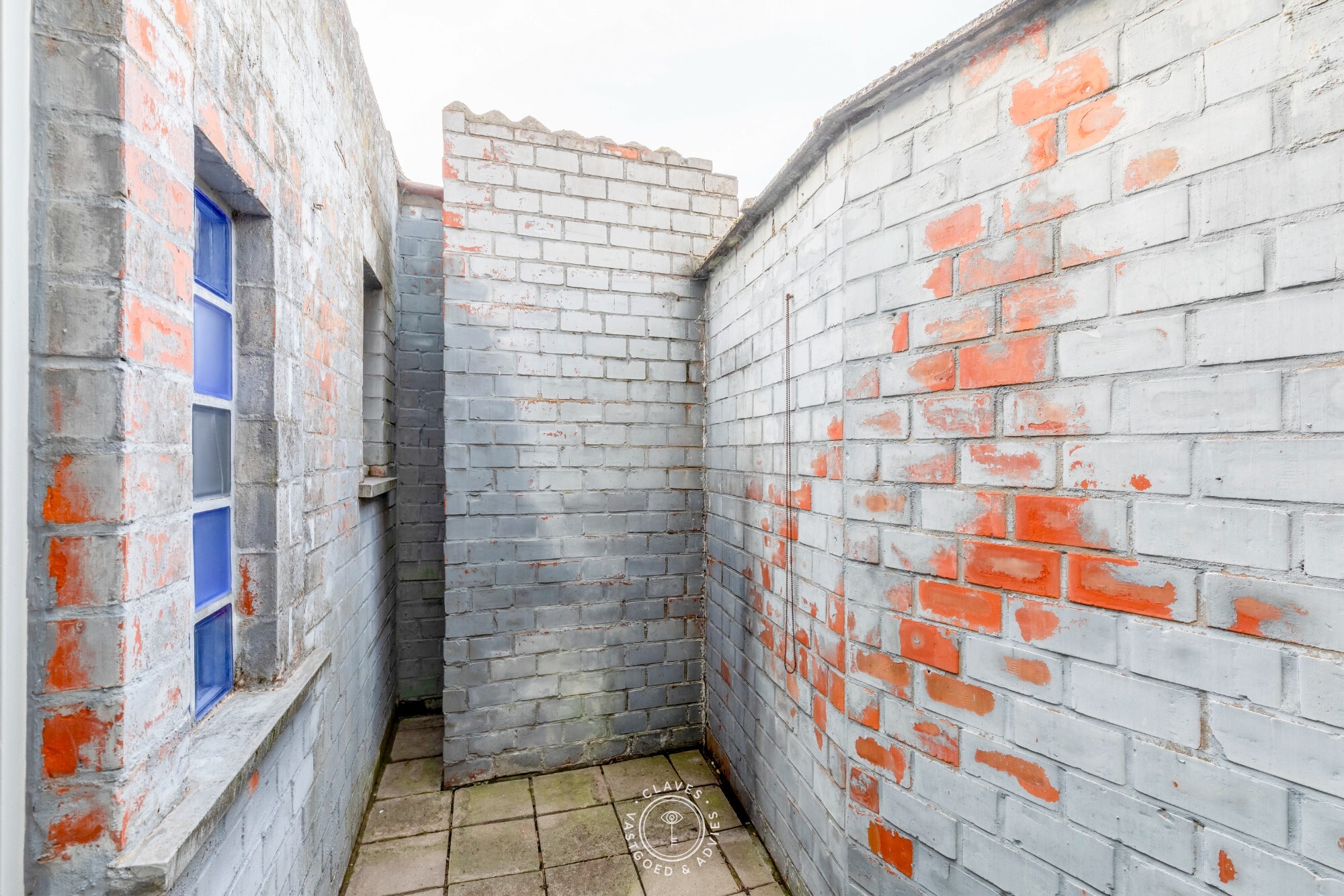 Te renoveren rijwoning met mogelijkheden in het hart van Nieuwkerken-Waas