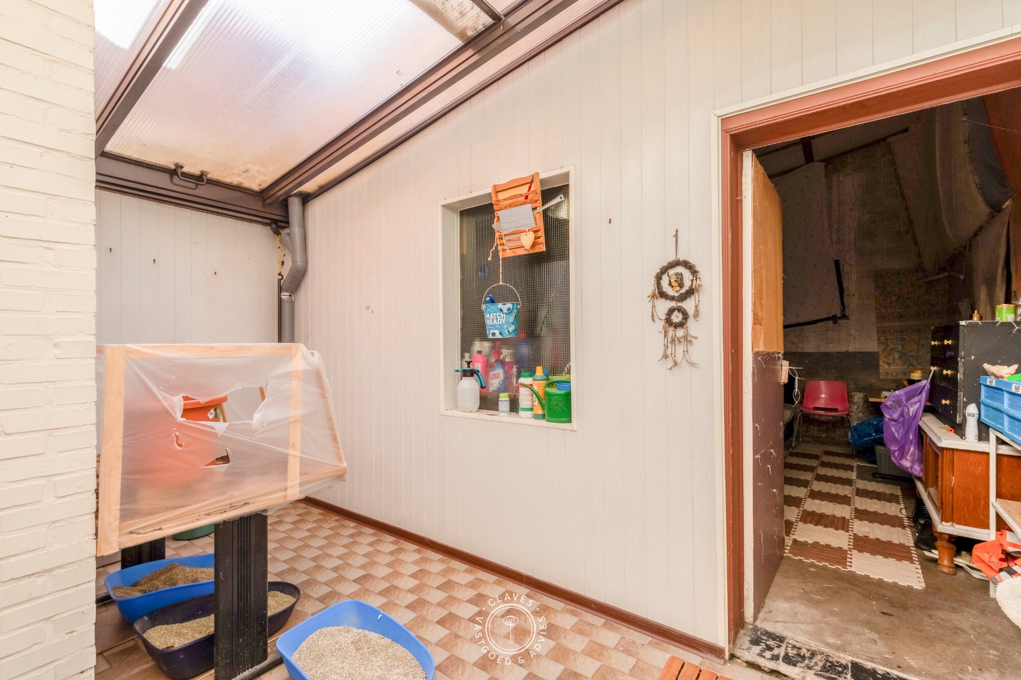 Te renoveren rijwoning met ruime garage en tal van mogelijkheden in Temse